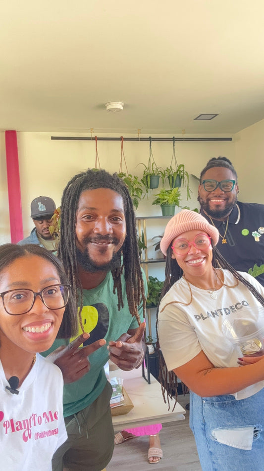 Grand reopening of Pink Pothos. Lakeisha with friends